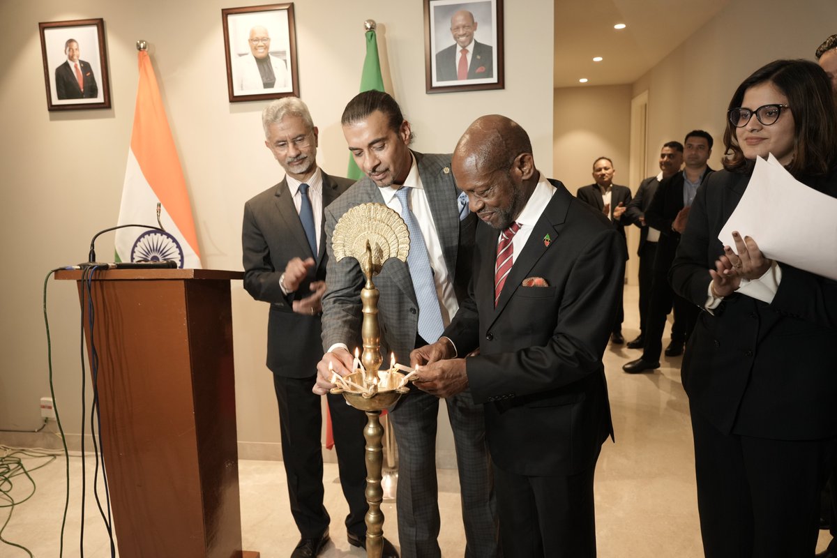 Gurdip Dev Bath lighting the ceremonial lamp at the High Commission opening